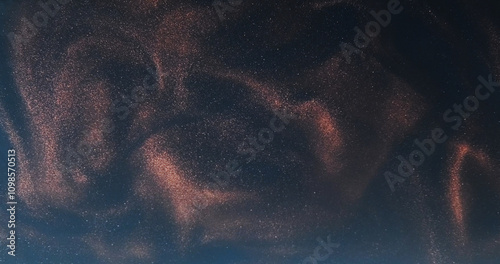 Glitter swirl. Ink cloud. Pink color shiny dust splash magic mist floating wave spreading on dark blue abstract background.