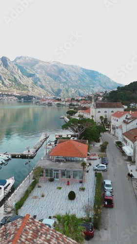 Vacation and travel concept. Kotor Boka Bay, winter aerial view from drone. Vertical shot