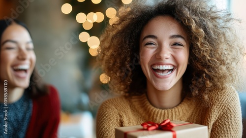 Smiling young woman with curly hair presenting a wrapped gift in a cozy holiday setting with a warm ambiance, spreading happiness and festive cheer. photo