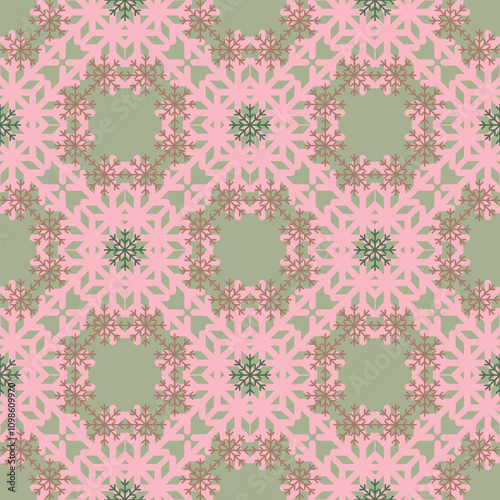 Colourful Christmas seamless vector pattern with pink and orange snowflakes on green. Geometric seasonal texture for wrapping paper, greeting cards, invitations, gift boxes and web background.