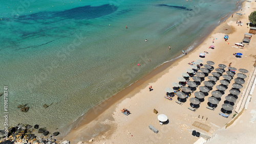 Aerial drone photo of paradise sandy organised beach of Provatas, Milos island, Cyclades, Greece