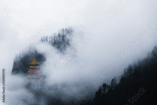 A serene temple nestled deep in a foggy mountain