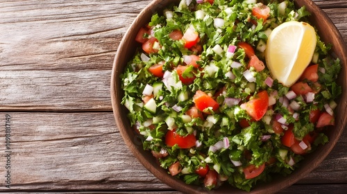 Traditional tabbouleh salad in a modern bowl. photo