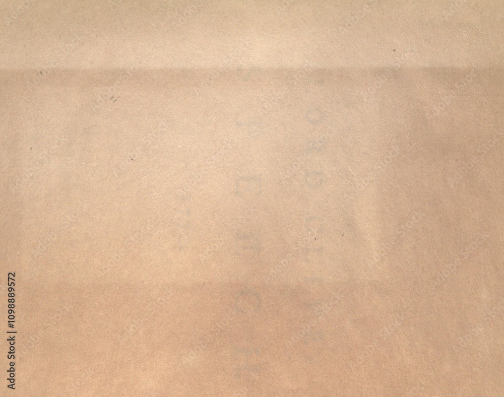 Fototapeta premium This grungy paper note is dated 1772 from India, with retro style flesh and antique quarter sorrell brown colours. Features a textured ancient paper background and the image has no people. Textured.