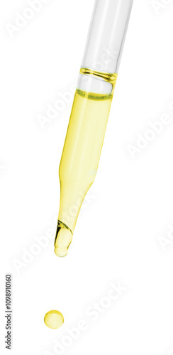 Dripping essential oil from pipette on white background