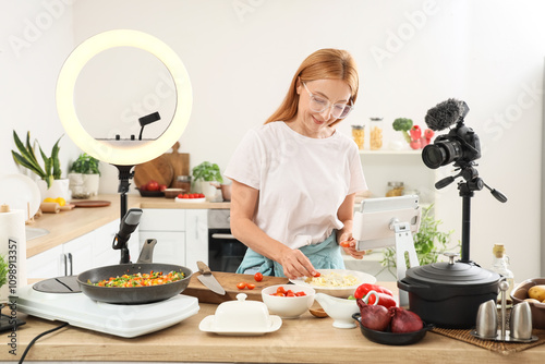 Female food blogger cooking...