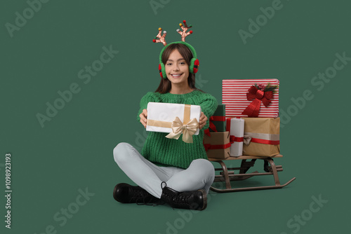 Young woman with reindeer h...
