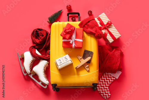 Suitcase with winter clothe...