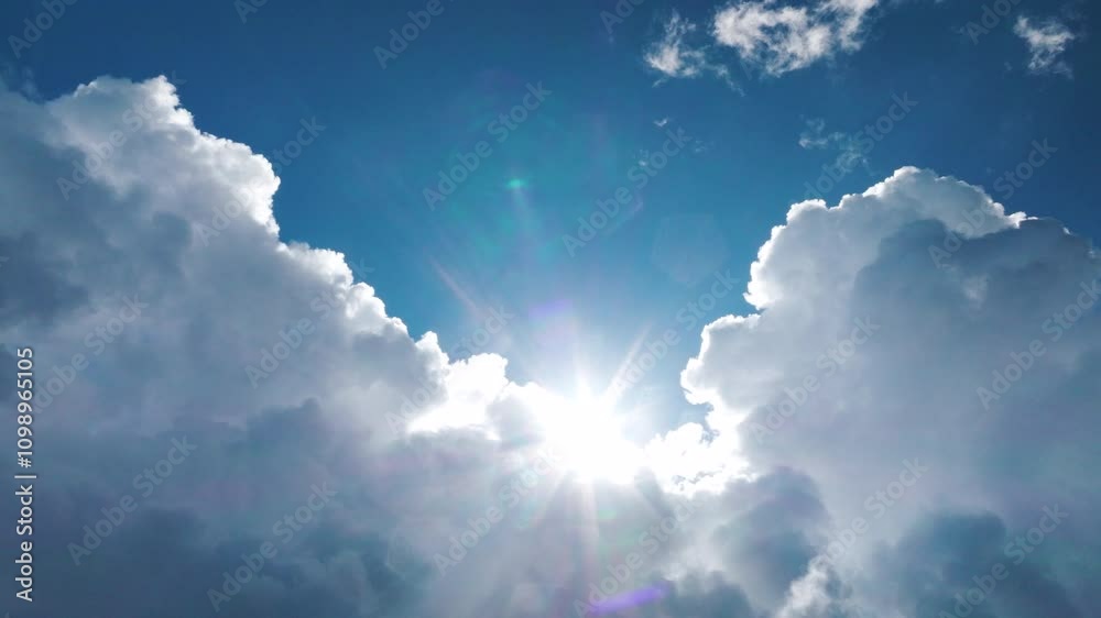 Aerial view of the sky with fluffy clouds and sunlight