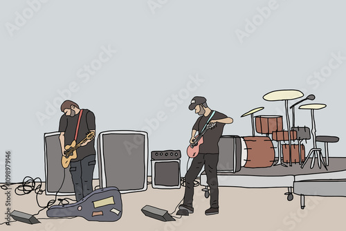 Two male guitarists wearing dark coloured clothing warming up before a gig with drums and speakers