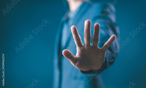 person's hand showing palm gestures stop, concept violence, warning, refuse, defense, caution. the hand sign of men a stop  photo