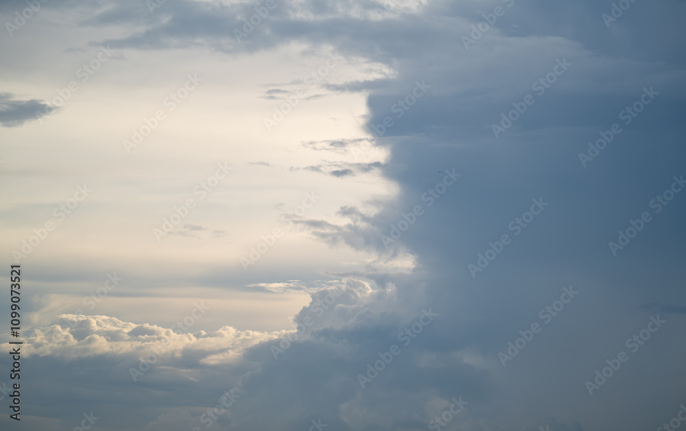 Fototapeta premium Dramatic cloudscapes fill the sky, showcasing nature's artistry with a breathtaking display of textures and colors. 