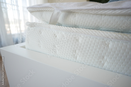 Enjoy the comfort of a soft mattress and a sturdy bed frame for an enhanced sleeping experience photo