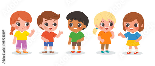 Group of elementary school children standing in the classroom and talking to each other.  Cute kids communicating with each other. Happy boys and girls meet and make friends at school.