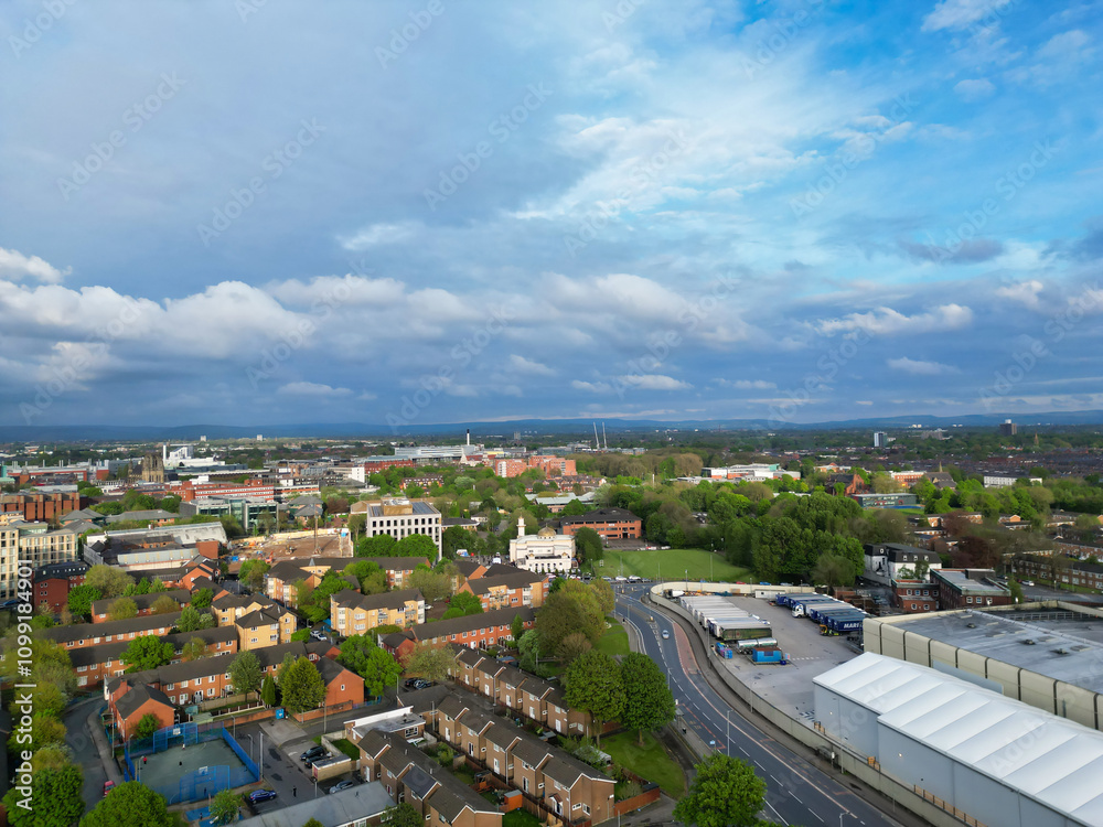 Obraz premium Aerial View of Buildings at Greater Manchester Central City, Northwest of England, United Kingdom. Aerial View Footage Was Captured with Drone's Camera on May 4th, 2024 During Sunset Time.