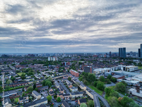 Aerial View of Buildings at Greater Manchester Central City, Northwest of England, United Kingdom. Aerial View Footage Was Captured with Drone's Camera on May 4th, 2024 During Sunset Time. photo