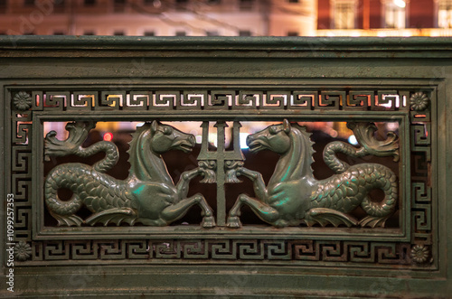 Cast-iron fence of Anichkov Bridge decoraded with sea-horses Hippocampus, Saint Petersburg, Russia