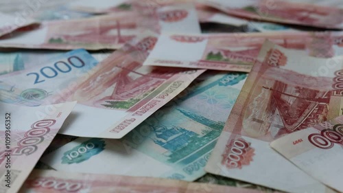 The currency of Russia. Close-up of Russian rubles. Financial concept. The background and texture of banknotes. Banknotes in denominations of 5000, 2000 and 1000 rubles. View from above