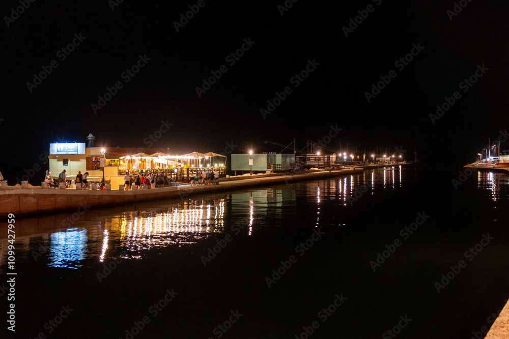 Fototapeta premium canal on the sea at night in Cesenatico Rimini Riviera Romagnola Italy
