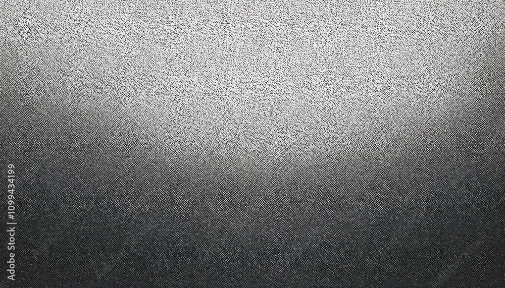 Obraz premium A textured grayscale gradient pattern with a dotted or stippled appearance transitioning from light to dark.