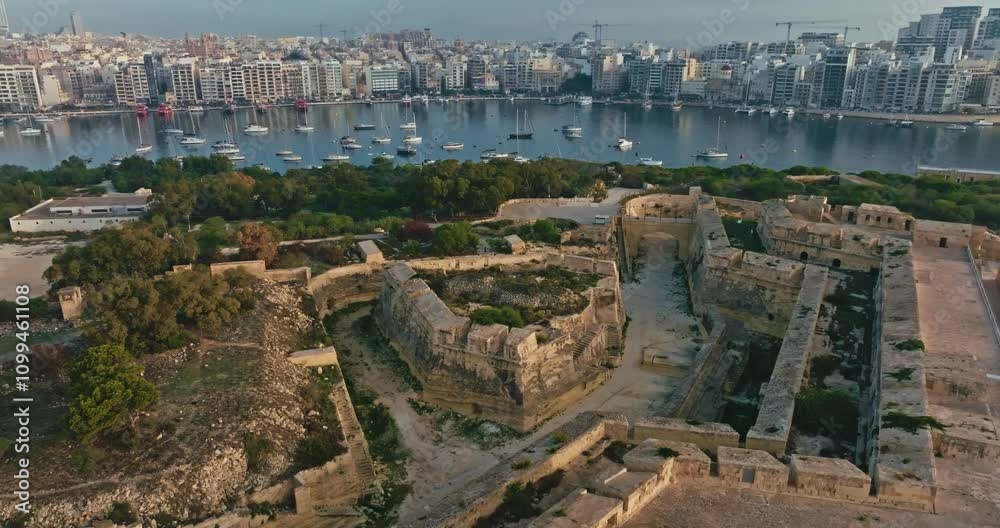 Aerial view of Fort Manoel on the island of Malta.. Ancient ruins on the shore of the Mediterranean Sea, a tourist historical point of the island. High quality 4k footage