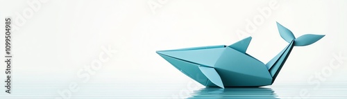 A serene image of a blue origami whale floating gently on calm water, symbolizing creativity and tranquility.