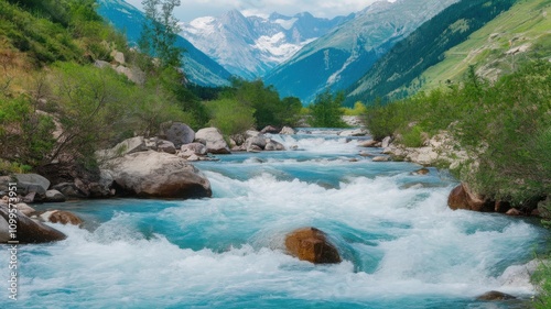 Crystal clear mountain stream with rushing turquoise water flowing through rocky terrain, surrounded by lush green hills.