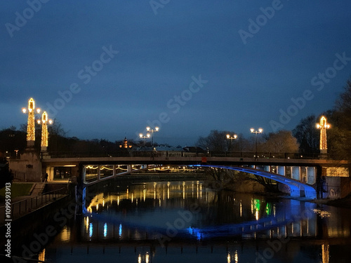 Rahu sild or the Peace Bridge with Christmas illumination during blue hour in the city Tartu, Tartumaa, Estonia, November 2020