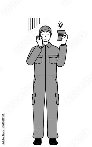 A mechanic in coveralls looking at his bankbook and feeling depressed.