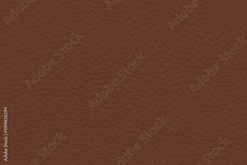 Textured close-up of light brown leather surface with detailed pattern

