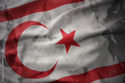 colourful waving flag of northern cyprus on the old army khaki texture background. military concept. photo