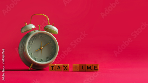 Don't Snooze on Your Taxes, A vintage alarm clock sits on a red background with copy space, with wooden blocks spelling out 