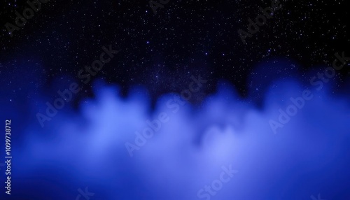 a close up of a blue fogy field with a star filled sky photo