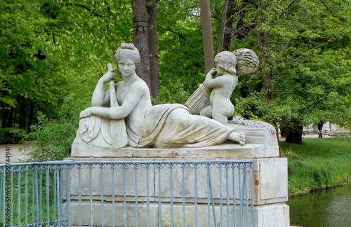 Poland, Warsaw, Łazienki Park (Royal Baths Park), Palace on the Isle, a sculpture depicting a personification of the Vistula River, as a semi-naked woman in a half-lying position photo