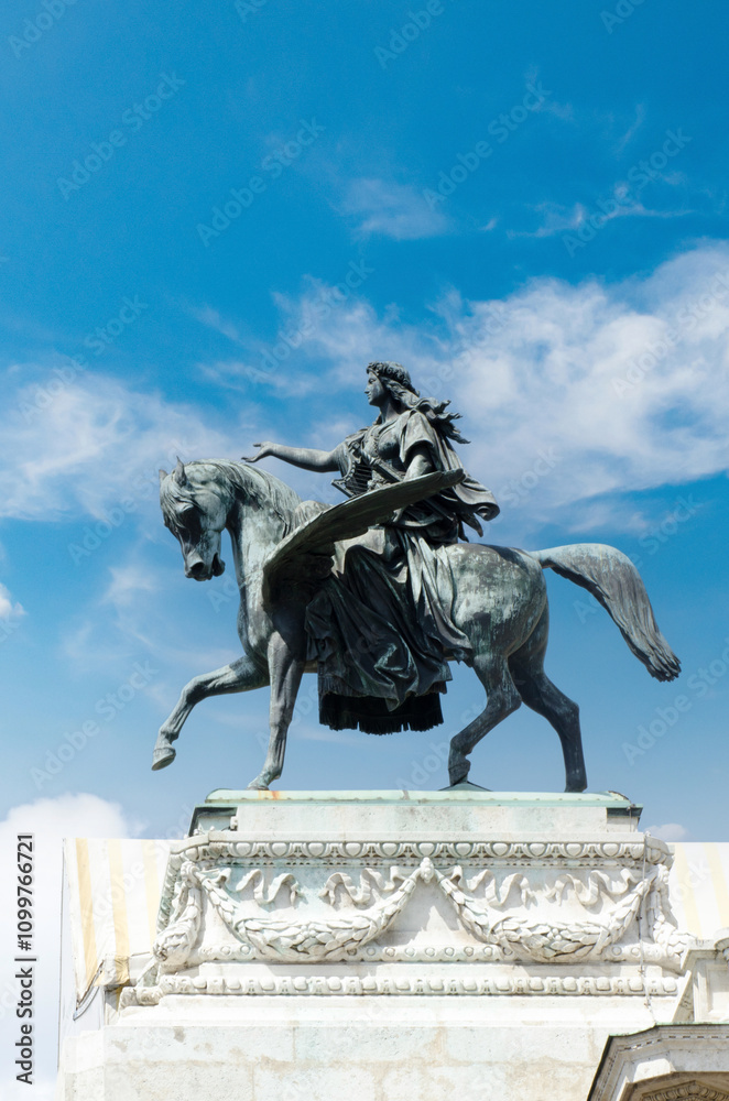Obraz premium The statue on top of the Vienna State Opera in Vienna, Austria. It was created by Ernst Julius Hehnel and represent the muse of poetry (Erato) on a flying horse
