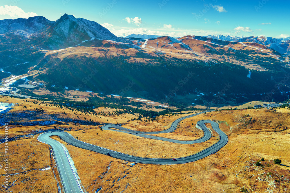 Mountain landscape on a sunny autumn day. View of highway in Pyrenees mountains, Andorra, Europe