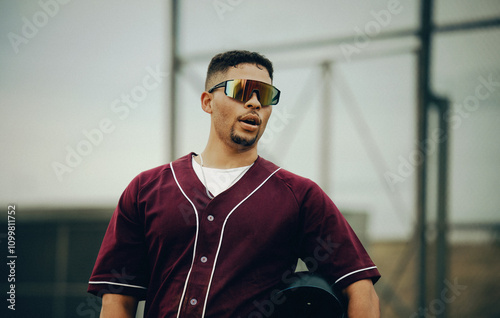 Baseball player reacts to a foul ball during an intense game
