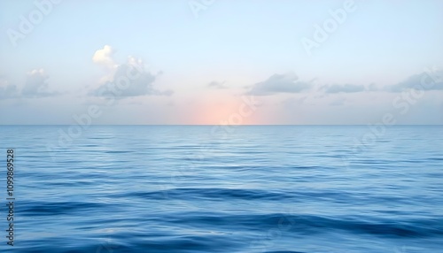 Tranquil Ocean with Soft Clouds and Calm Waters