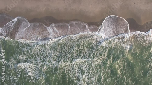waves flowing onto the beach