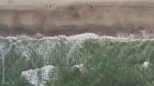 waves flowing onto the beach