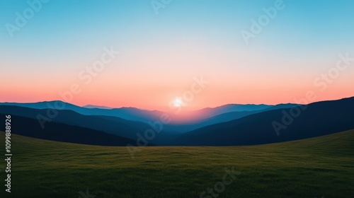 A beautiful sunset over a mountain range with a large