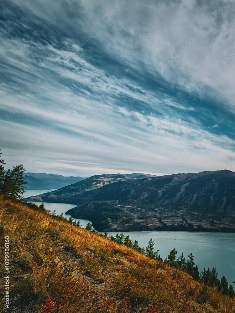 Obraz premium kanasi lake landscape or mountain view, scenery of mountain in China, travel destination or tour tourism, xinjiang, majestic panorama nature view. destination, blue sky, hill top, calmness.