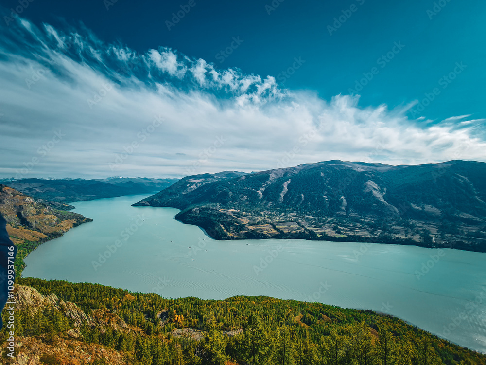 Fototapeta premium kanasi lake landscape or mountain view, scenery of mountain in China, travel destination or tour tourism, xinjiang, majestic panorama nature view. destination, blue sky, hill top, calmness.