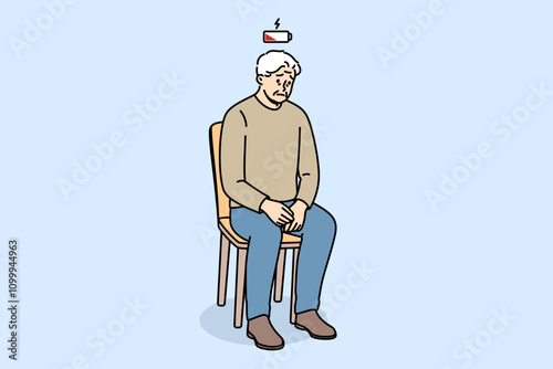 Depletion of vitality is felt by elderly man sitting on chair, with empty battery above head. Depletion of vitality in pensioner who needs support from friends and relatives to avoid depression