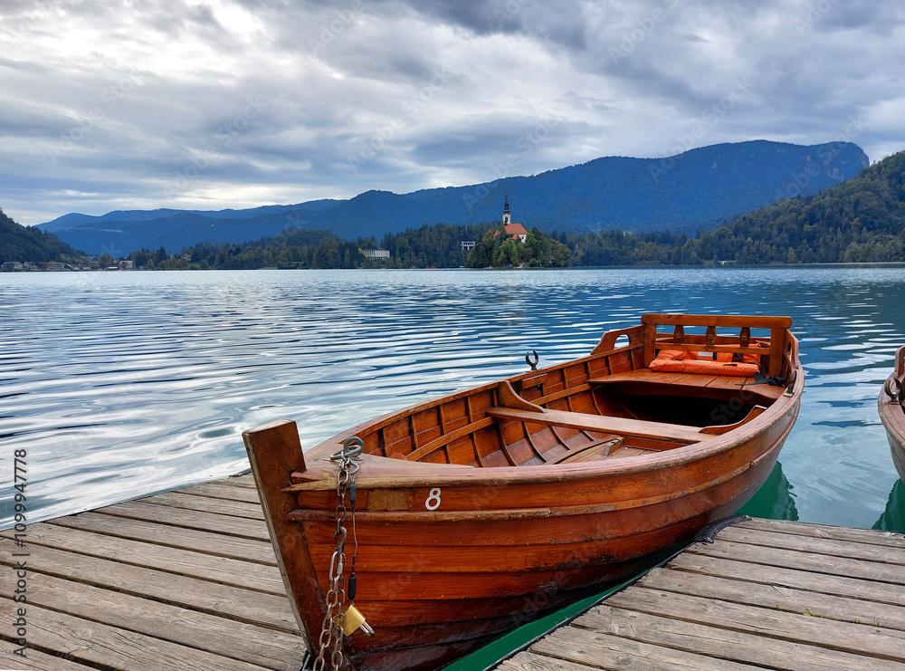 boat and dark blue water of lake Bled. Slovenia