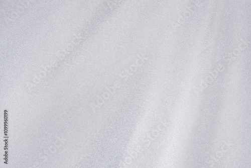 Wallpaper Mural A smooth light gray fabric cascades gracefully, illuminated by soft ambient lighting. The subtle texture enhances the sophisticated atmosphere of the surrounding area. Torontodigital.ca