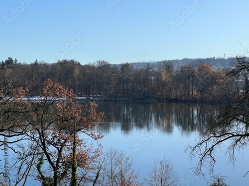 Late autumn atmosphere on the Swiss Katzenseen lakes or Katzensee lakes (Katzen lakes), Regensdorf - Lenzerheide - Canton of Zurich (Zürich or Zuerich), Switzerland (Schweiz) photo