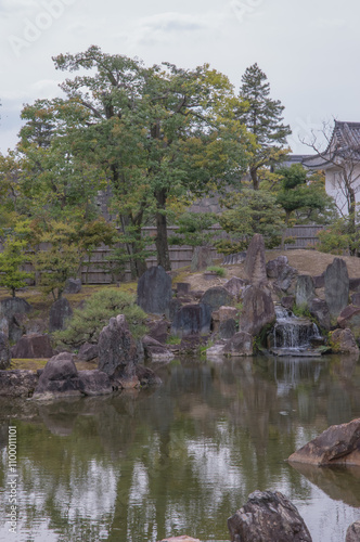 Traditional japanese gardens surrounding a castle - Serenity and natural harmony. photo