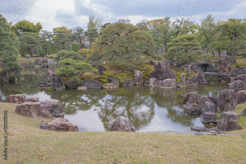 Traditional japanese gardens surrounding a castle - Serenity and natural harmony. photo