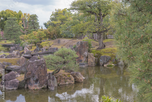 Traditional japanese gardens surrounding a castle - Serenity and natural harmony. photo